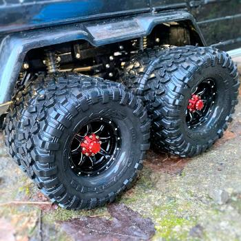 Ready-mounted brass adapters on the Traxxas TRX 6 twin tires. View 2